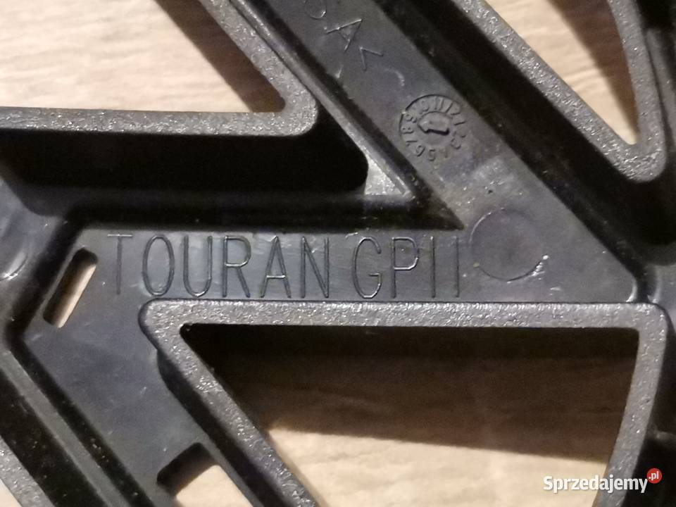 VW TOURAN 1115 PODSTAWA EMBLEMATU PRZÓD Międzychód