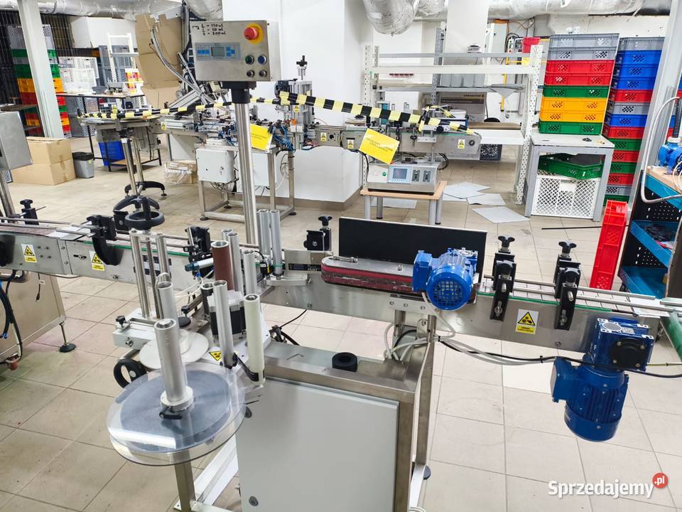 Automatyczna etykieciarka do pojemników o