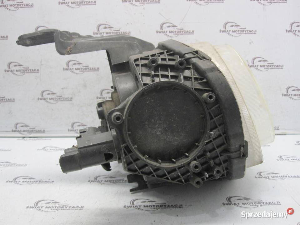 NISSAN JUKE 11r lampa lewa przód 55410000 ANGLIK Oświetlenie