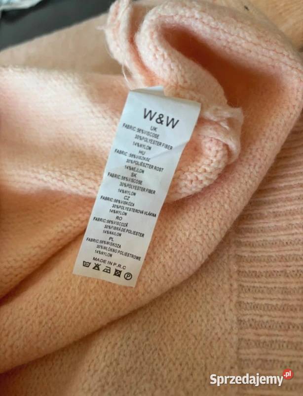 Sweter pudrowy róż z cekinami uroczy i elegancki Szczecin