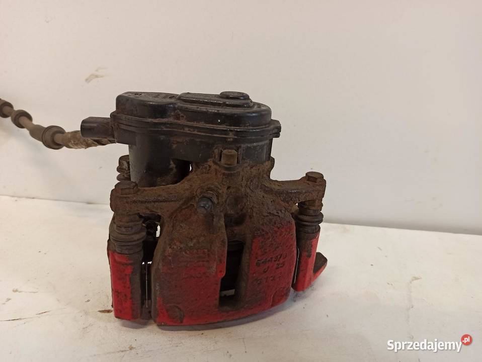 AUDI A4 B8 ZACISK HAMULCOWY PRAWY TYŁ 8K0615404E