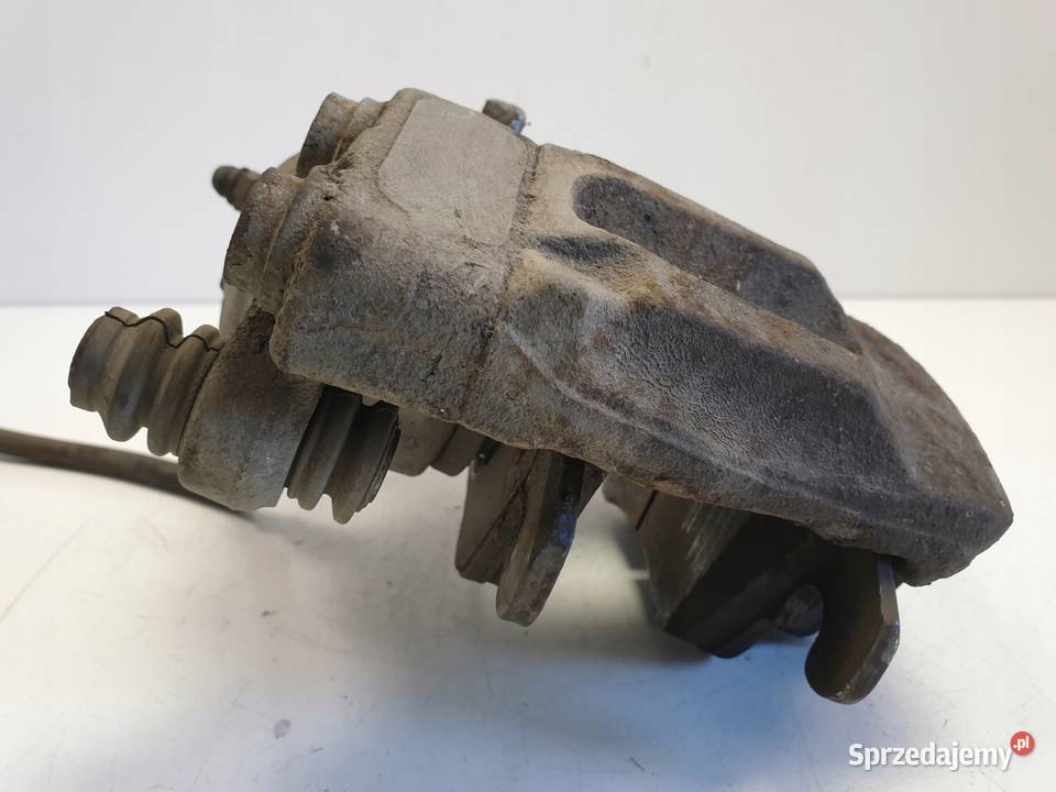 Mercedes C207 30 CDI ZACISK HAMULCOWY Lewy przód Rudka