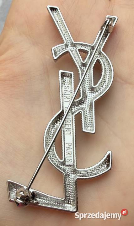Broszka YSL srebrna metaliczna