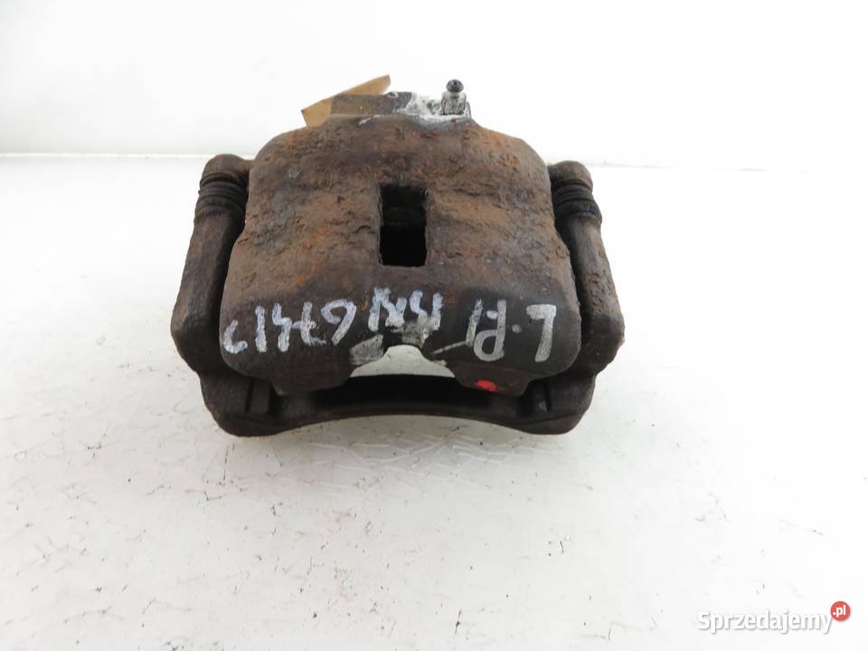 ZACISK LEWY PRZÓD NISSAN PRIMERA P11 20 16V osobowe