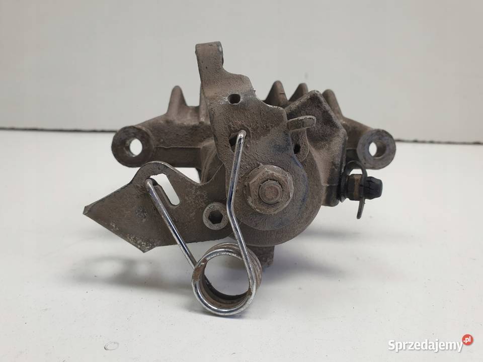 VW Golf IV LEWY ZACISK HAMULCOWY tył KIEROWCY osobowe