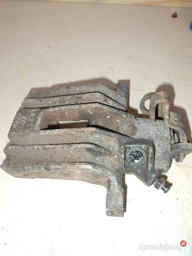 Zacisk hamulcowy Golf IV prawy tył
