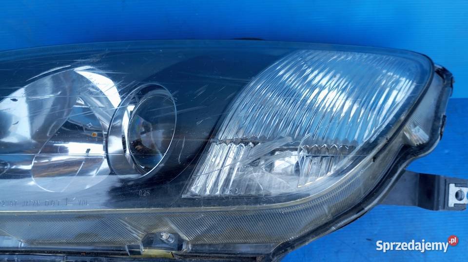 LAMPA LEWY PRZÓD REFLEKTOR EU XENON 10022312 Nowy Tomyśl