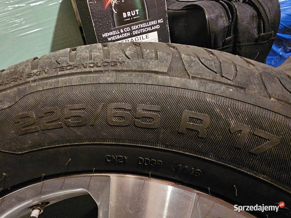 Volkswagen oryginalne alufelgi z oponami Warszawa