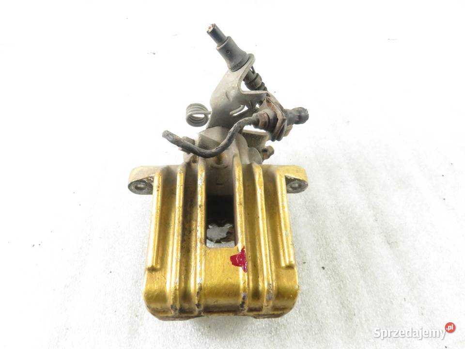 ZACISK LEWY TYŁ VW GOLF VI 16 TDI