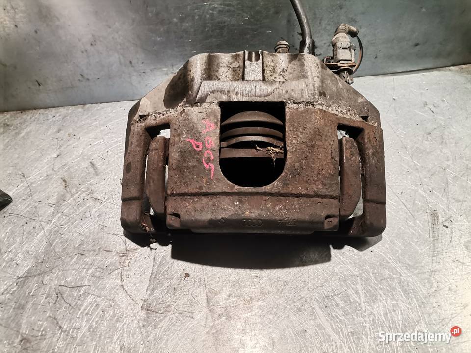 ZACISK 974 PRAWY PRZÓD AUDI A4 B6 A6 C5 LIFT POD Zaciski i jarzma małopolskie