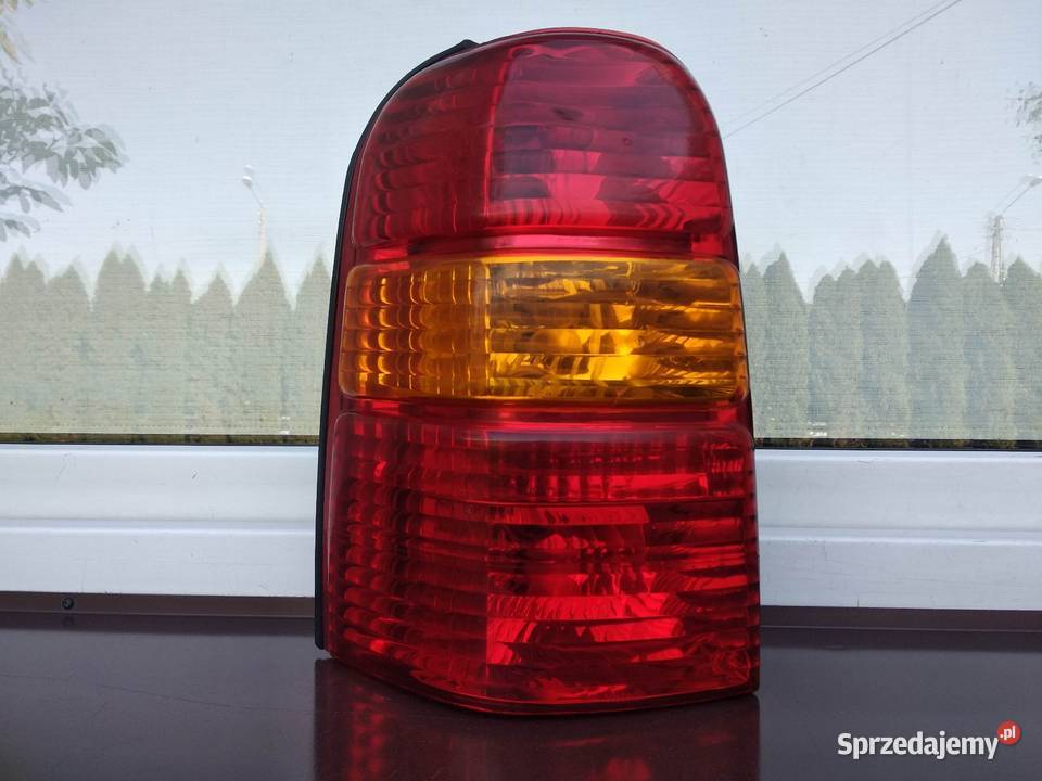 Ford Maverick 2 II lampa tył tylna lewa oryginał osobowe