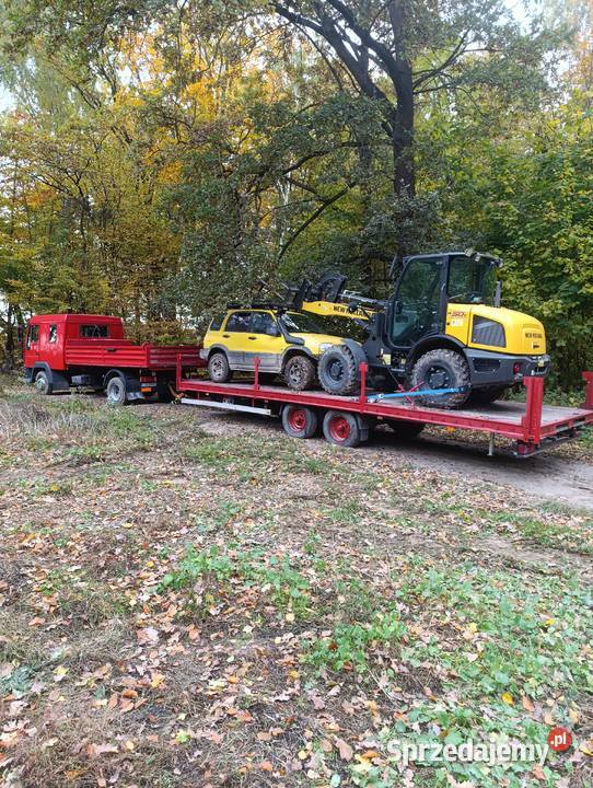 Transport laweta auto pomoc koparki ładowarki Janów Lubelski