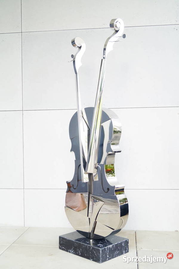 Srebrne skrzypce stal nierdzewna na marmurze Gizałki