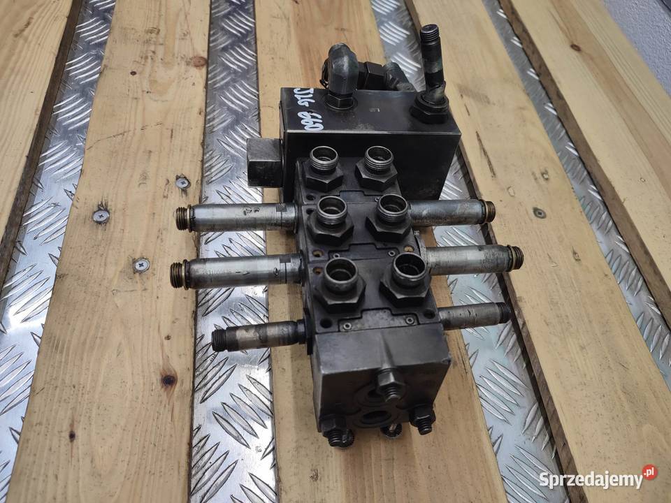 Kostka hydrauliczna JLG 660 R933002826 Pozostałe wielkopolskie