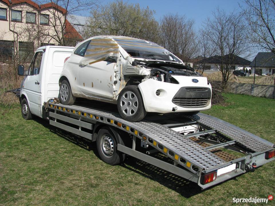 Laweta Autolaweta Transport PolskaEU Stawka 95gr Łask usługi moto