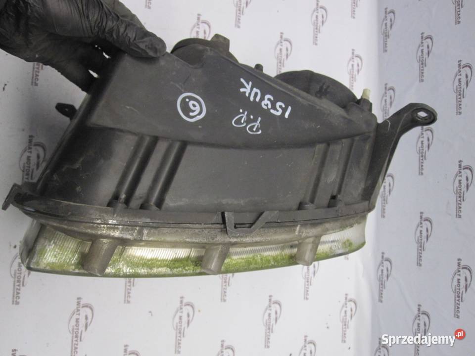 DACIA DUSTER I 13r lampa prawy przód 1305630832