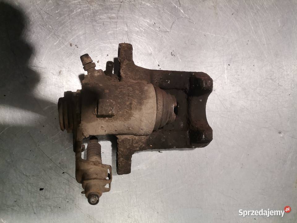 ZACISKI ZACISK LEWY TYŁ VW POLO IV 9N Zaciski i jarzma Nowy Sącz