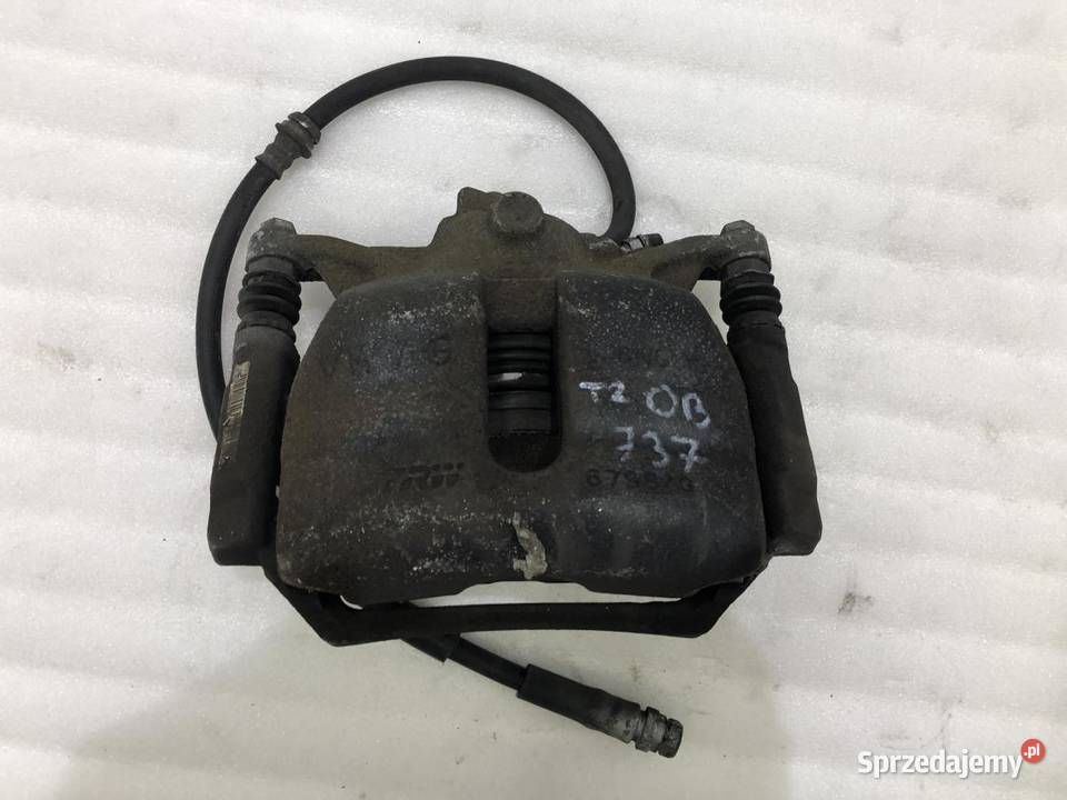 ZACISK LEWY PRZÓD VOLKSWAGEN TOURAN III