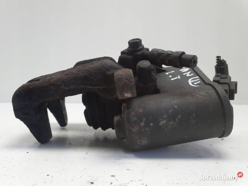 VW Tiguan TYLNY ZACISK HAMULCOWY lewy tył sprzedam