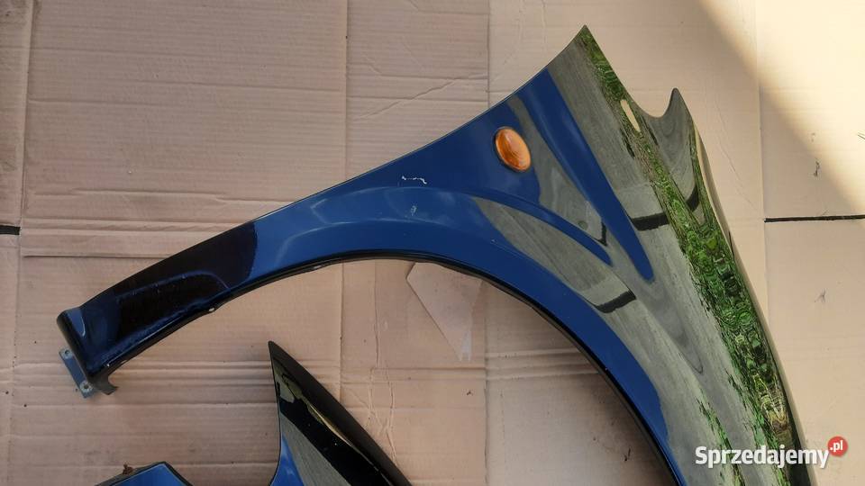 błotnik prawy lewy Chrysler Voyager IV czarny Dębno