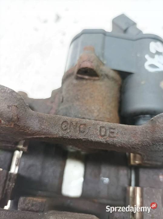 ZACISK HAMULCOWY LEWY TYŁ 32 FSI ELEKTRYCZNY