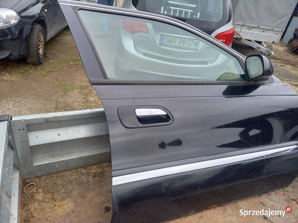 Drzwi prawe przednie lincoln continental 2000r Sierakowice