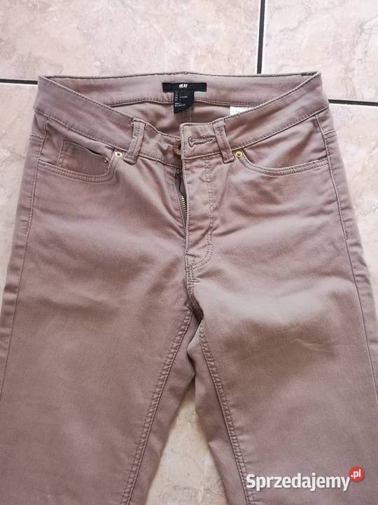 Beżowe spodnie HM w rozmiarze 34 Tuchów