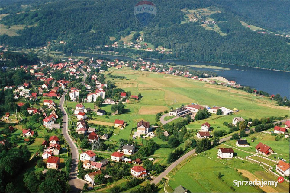 Czterokondygnacyjny budynek jeziorem sprzedam