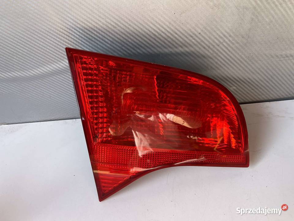AUDI A4 B7 LEWA LAMPA TYŁ KOMBI W KLAPĘ lewe Lampy tylne Ostroróg