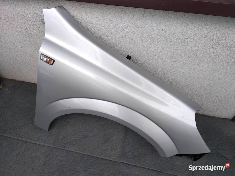 Opel Astra H błotnik przedni prawy srebrny Z157 Sieradz