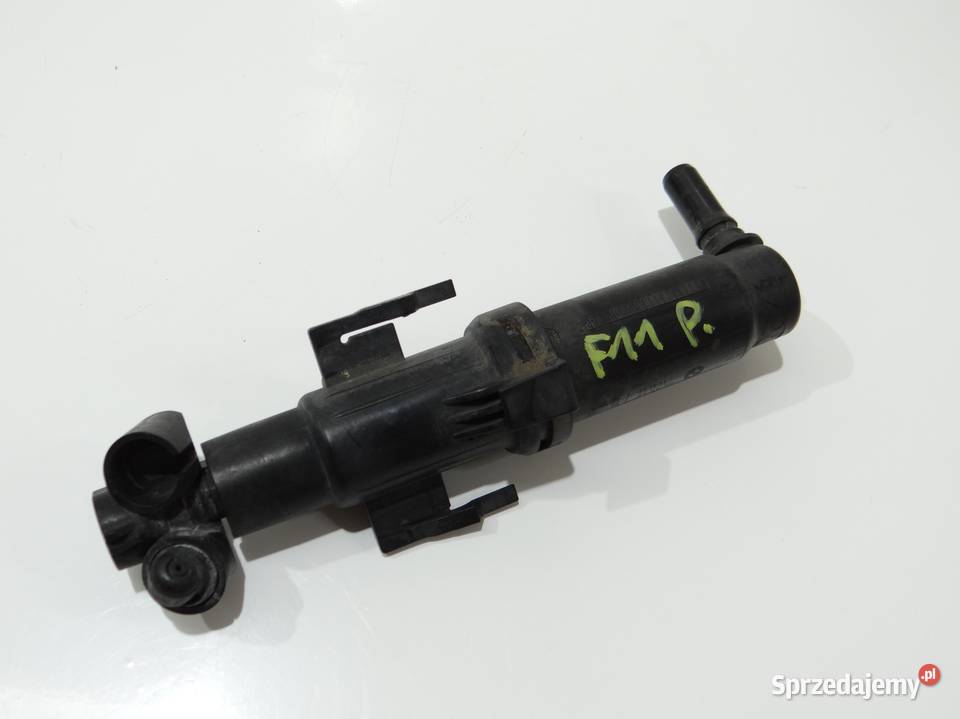 SPRYSKIWACZ LAMPY PRAWY BMW F11 7149886 osobowe Strzyżewice sprzedam