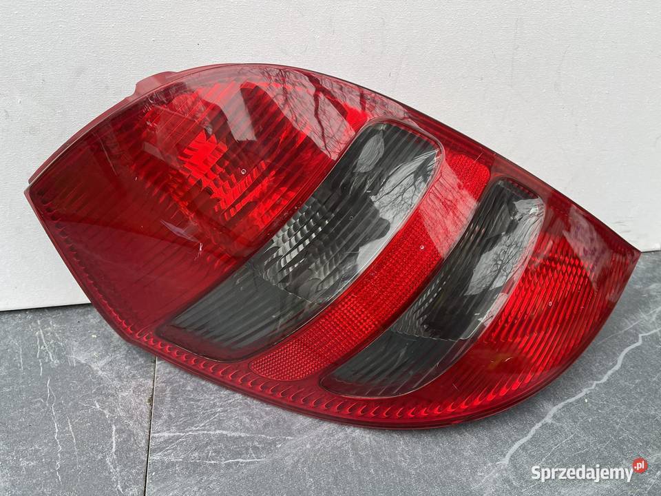 MERCEDES AKLASA W169 LEWA LAMPA TYŁ CIEMNA osobowe wielkopolskie Ostroróg
