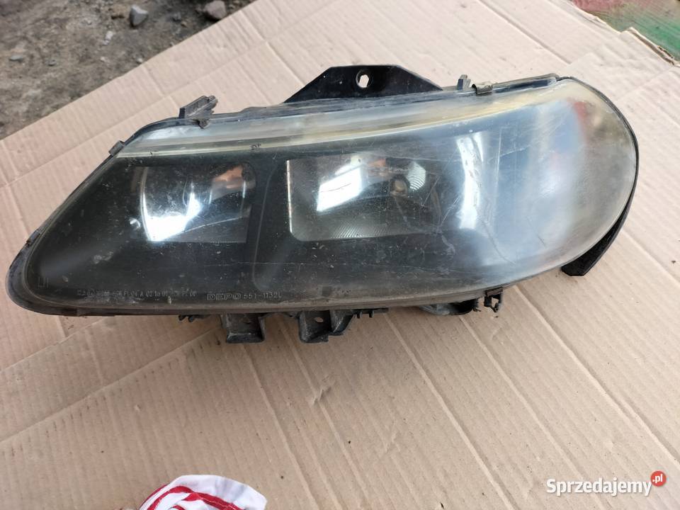 LAGUNA 1 LAMPA PRZÓD LEWA Kamień-Kolonia