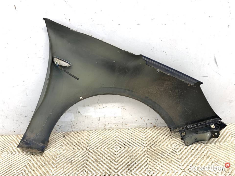 BŁOTNIK LEWY PRZÓD OPEL ZAFIRA C Minivan Carbon podkarpackie