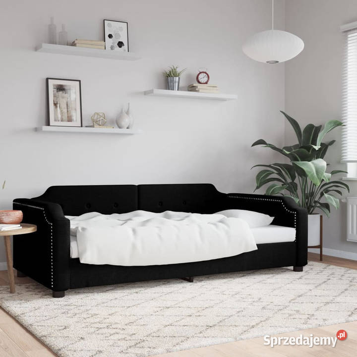 Sofa z funkcją spania czarna obita tkaniną Łóżka mazowieckie sprzedam