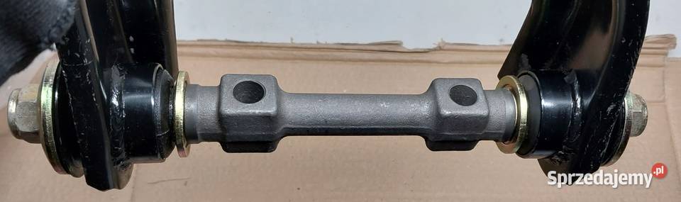 WAHACZ GÓRA LP MITSUBISHI L200 25D 11861096 Zawieszenie i układ kierowniczy Mielęcin