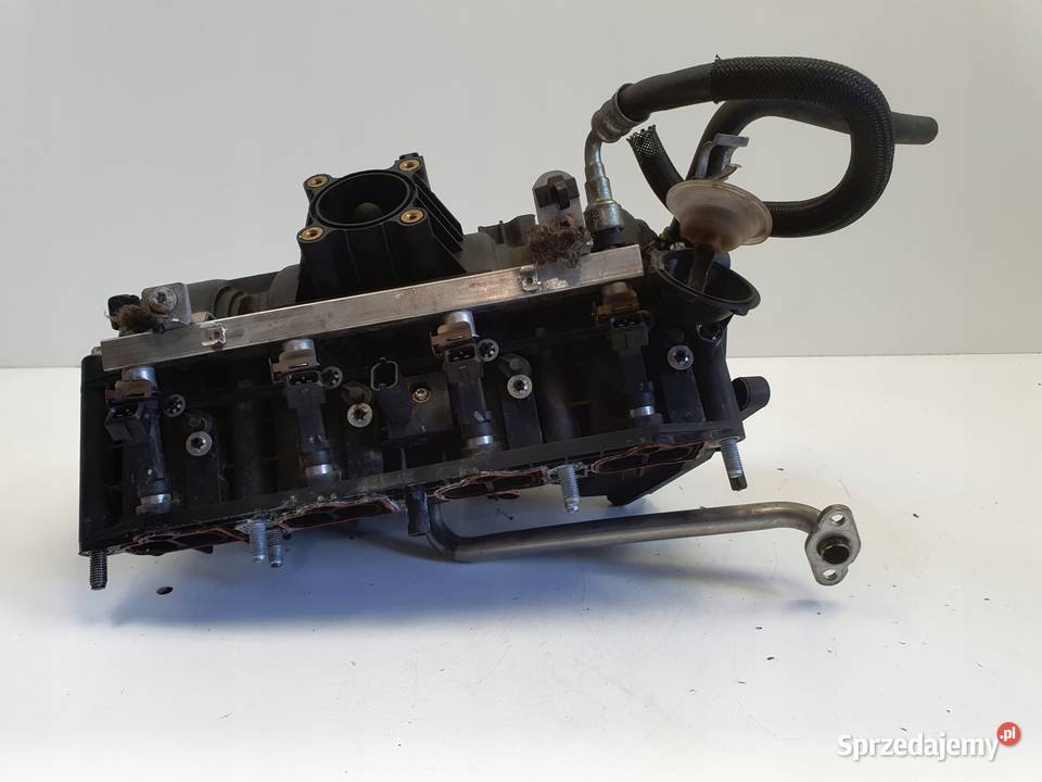 Opel Corsa D 14 16V KOLEKTOR SSĄCY 0280600047 Rudka