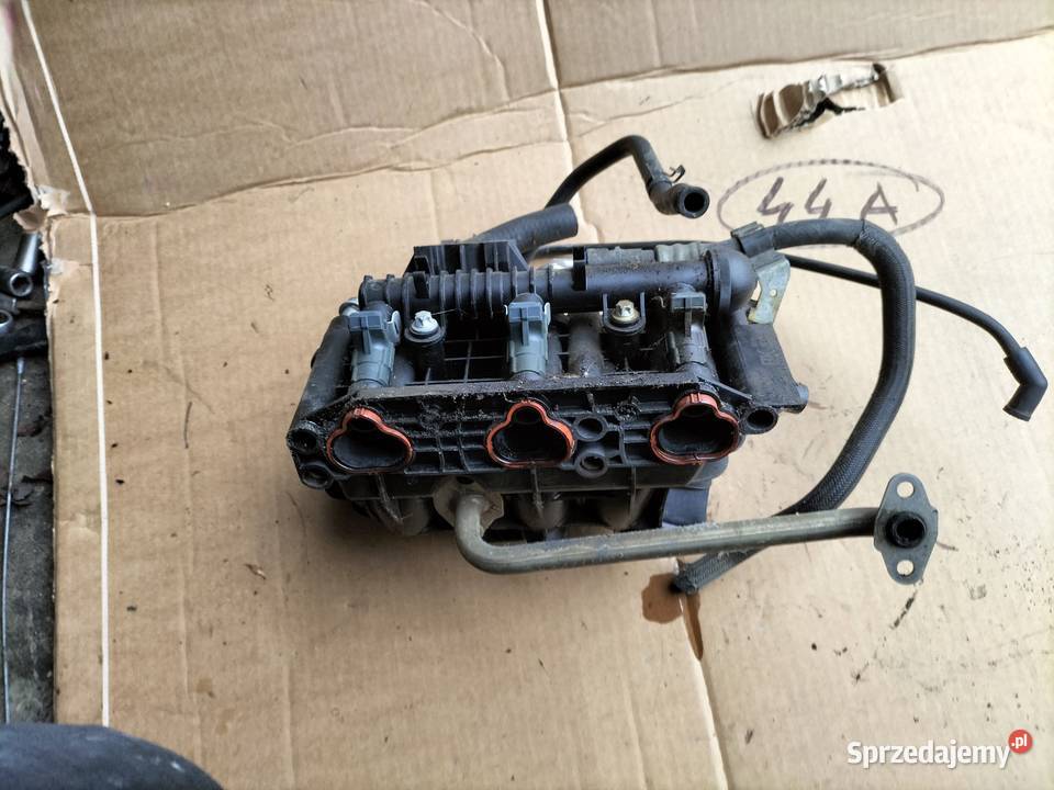 OPEL AGILA A CORSA C 10 KOLEKTOR SSĄCY LISTWA osobowe