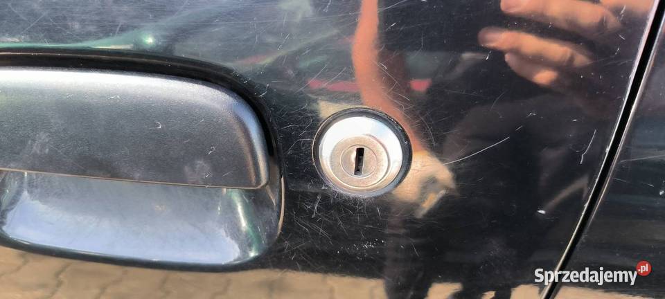 DRZWI LEWE PRZÓD SUZUKI IGNIS 2001 Lipno