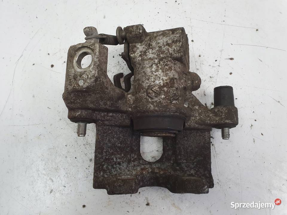 Toyota Yaris IV TYLNY ZACISK HAMULCOWY lewy tył Rudka