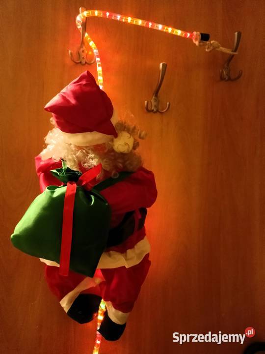Mikołaj wspinający się linie z wężem led