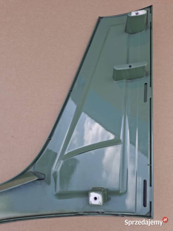 ACTROS MP4 PAMKA LISTWA OSŁONA REFLEKTORA PRAWA Części samochodowe Bieleń