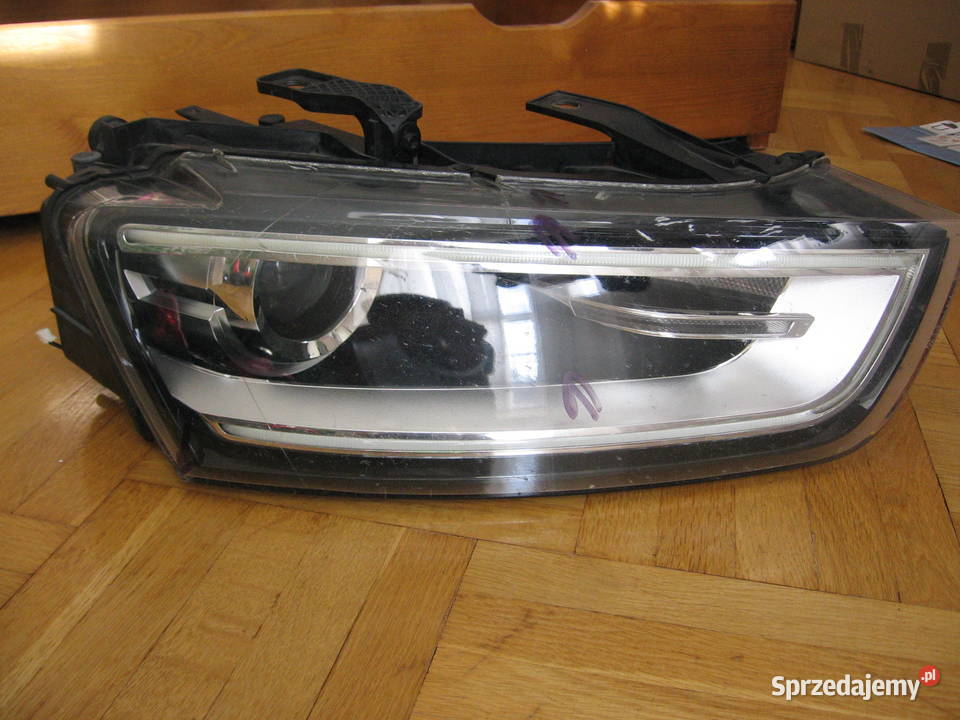 Reflektor lapma przednia przód Audi Q3 20112014 prawe Lampy przednie Warszawa