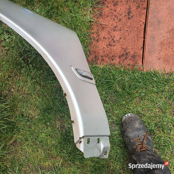 Błotnik lewy 42626 Volvo s60 v70 II 00 srebrny Kraków