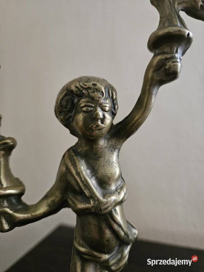 Świeczniki mosiądz złocony puttocherubiny Kowal