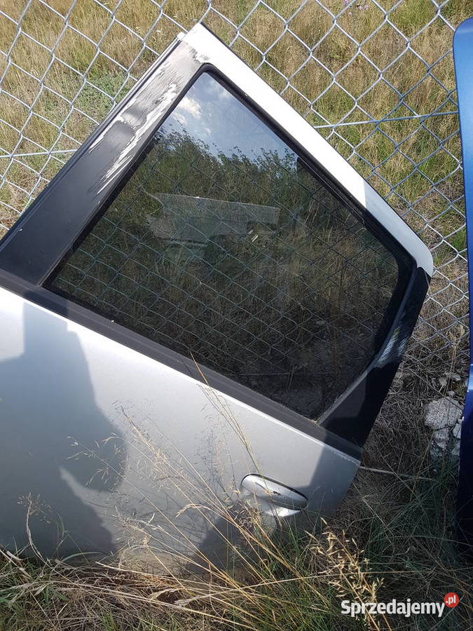 MITSUBISHI COLT Z30 2010 SZYBA LEWA TYL DRZWI osobowe wielkopolskie