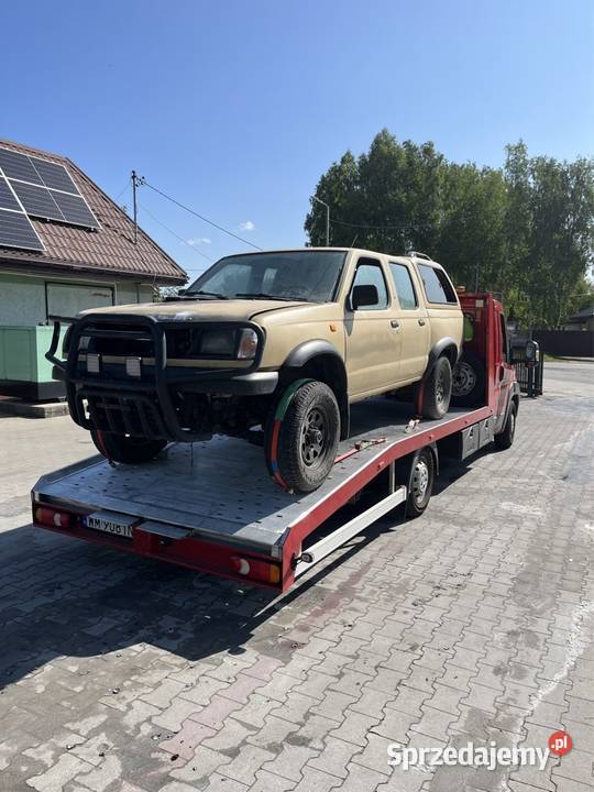 pomoc drogowa auto laweta transport maszyn Kołbiel