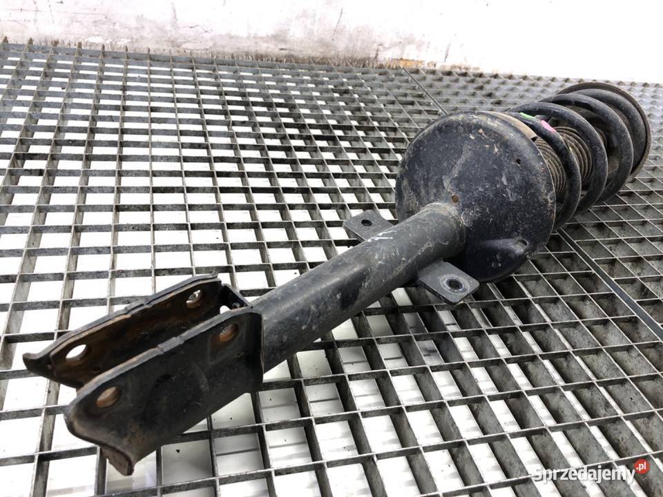 AMORTYZATOR PRAWY TYŁ ZE SPRĘŻYNĄ DACIA DUSTER osobowe