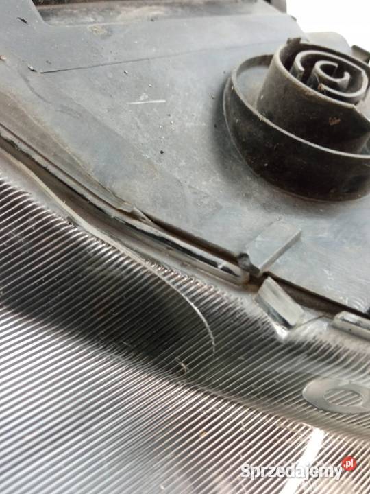 LAMPA PRZÓD PRAWA SOCZEWKA H7 EU USZKODZONA Saab