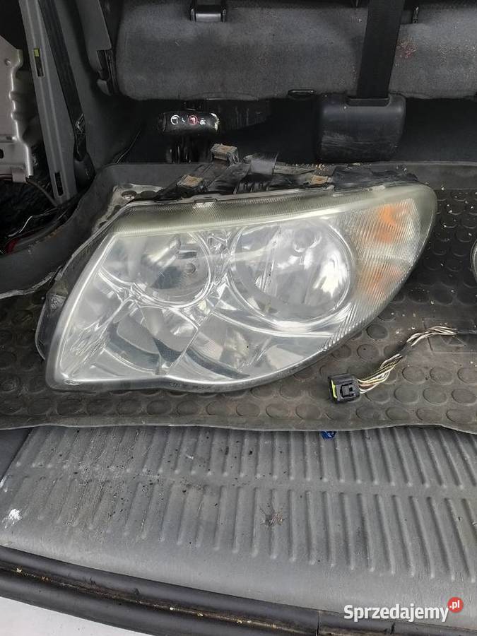 CHRYSLER GRAND VOYAGER REFLEKTOR LIFT 0407 R Rok produkcji 2005 Oświetlenie Kawnice